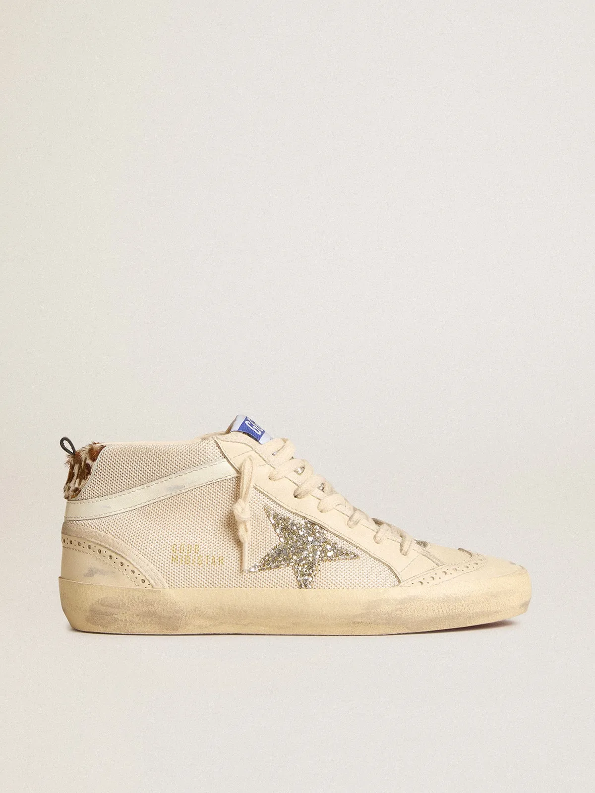 Mid Star femme en résille avec étoile à paillettes platine et virgule en cuir blanc | Golden Goose