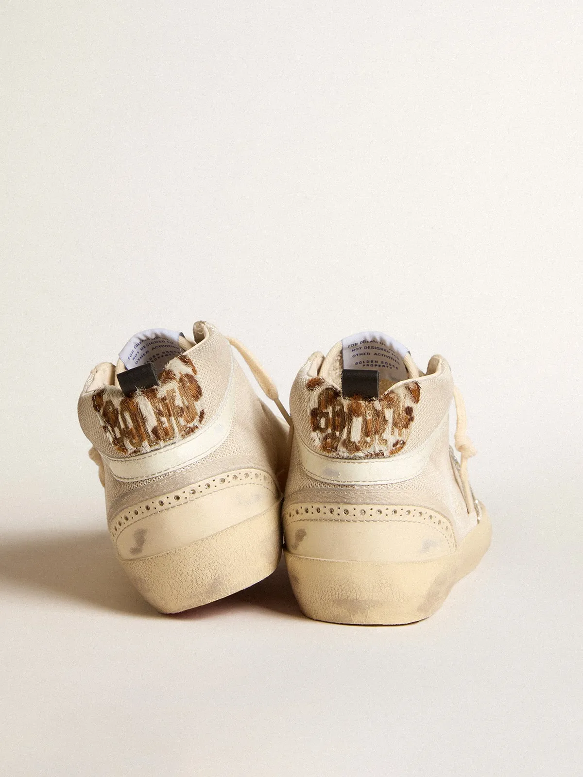 Mid Star femme en résille avec étoile à paillettes platine et virgule en cuir blanc | Golden Goose