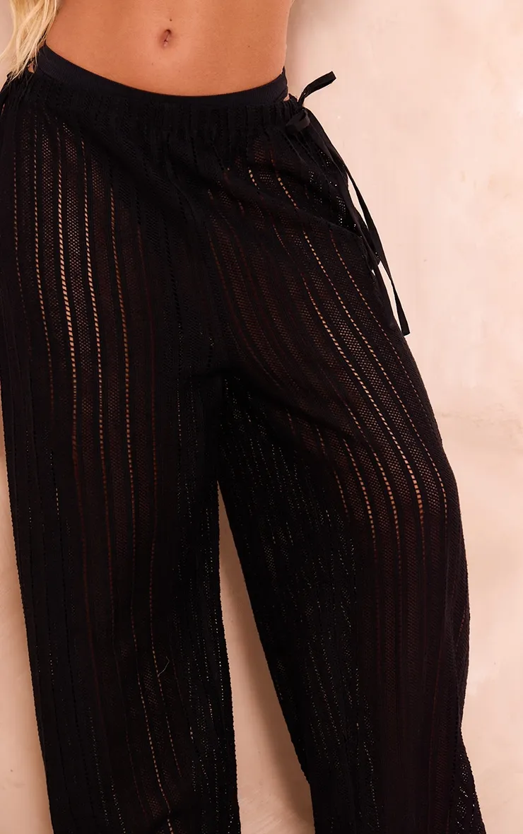 Pantalon large en jacquard noir à taille élastique