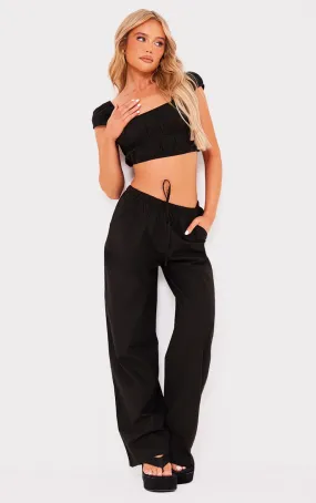 Pantalon large fluide effet lin noir à cordons ajustables