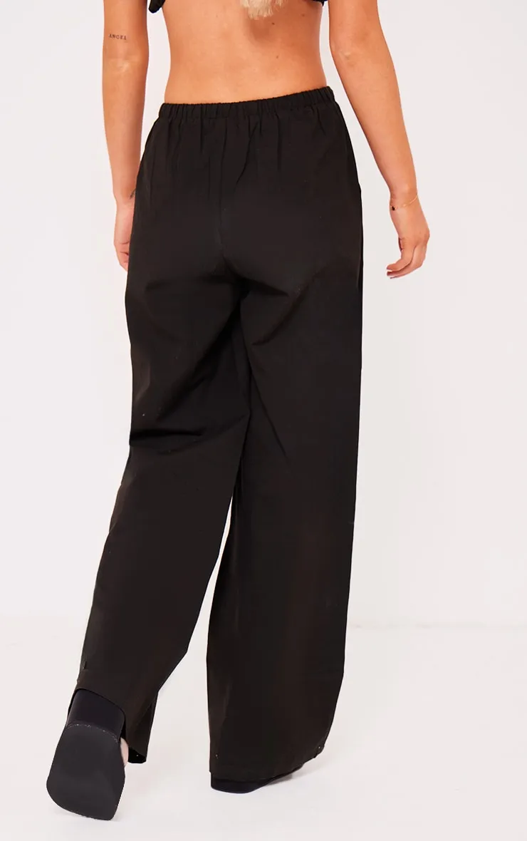 Pantalon large fluide effet lin noir à cordons ajustables