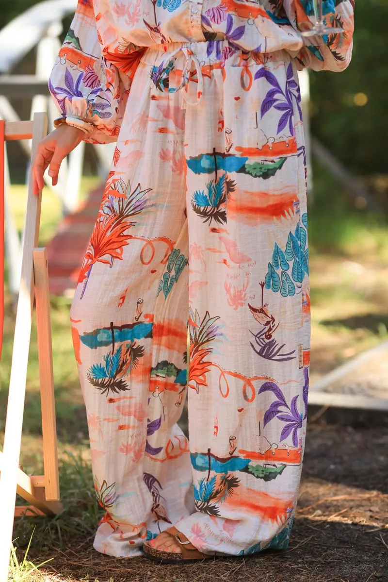 Pantalon large fluide écru motifs aléatoires colorés vacances d'été plage