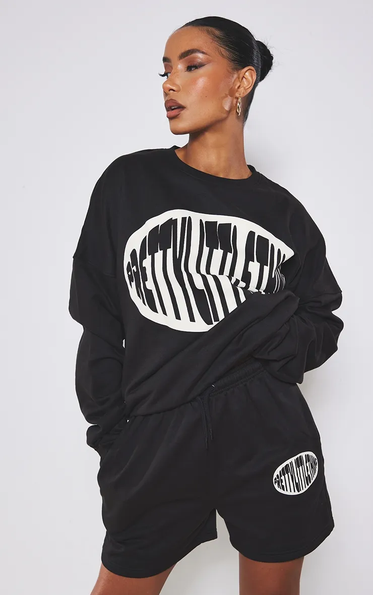 PRETTYLITTLETHING Sweat oversize noir à slogan imprimé