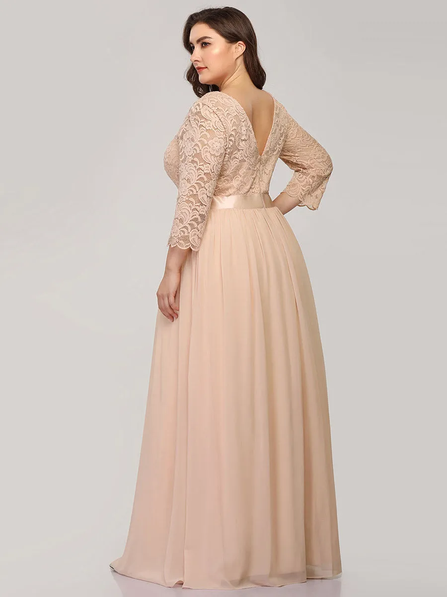 Robe de soirée en dentelle transparente au sol avec demi-manches