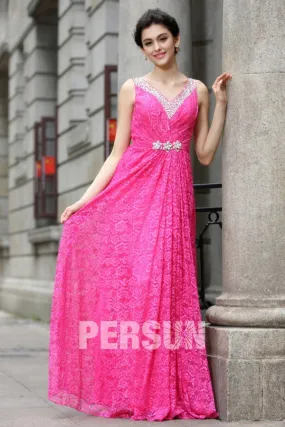 Robe en dentelle fuchsia pour mariage avec bretelles ornée de bijoux dos décolleté en V