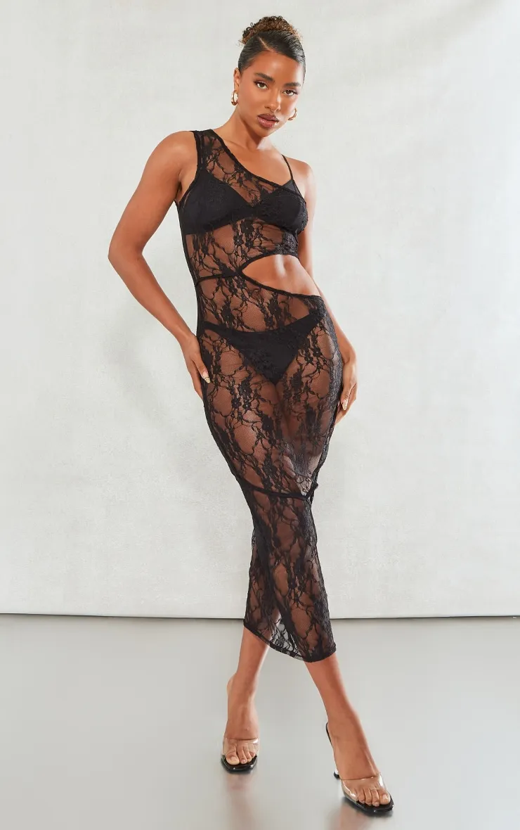 Robe longue asymétrique transparente en dentelle noire à découpes