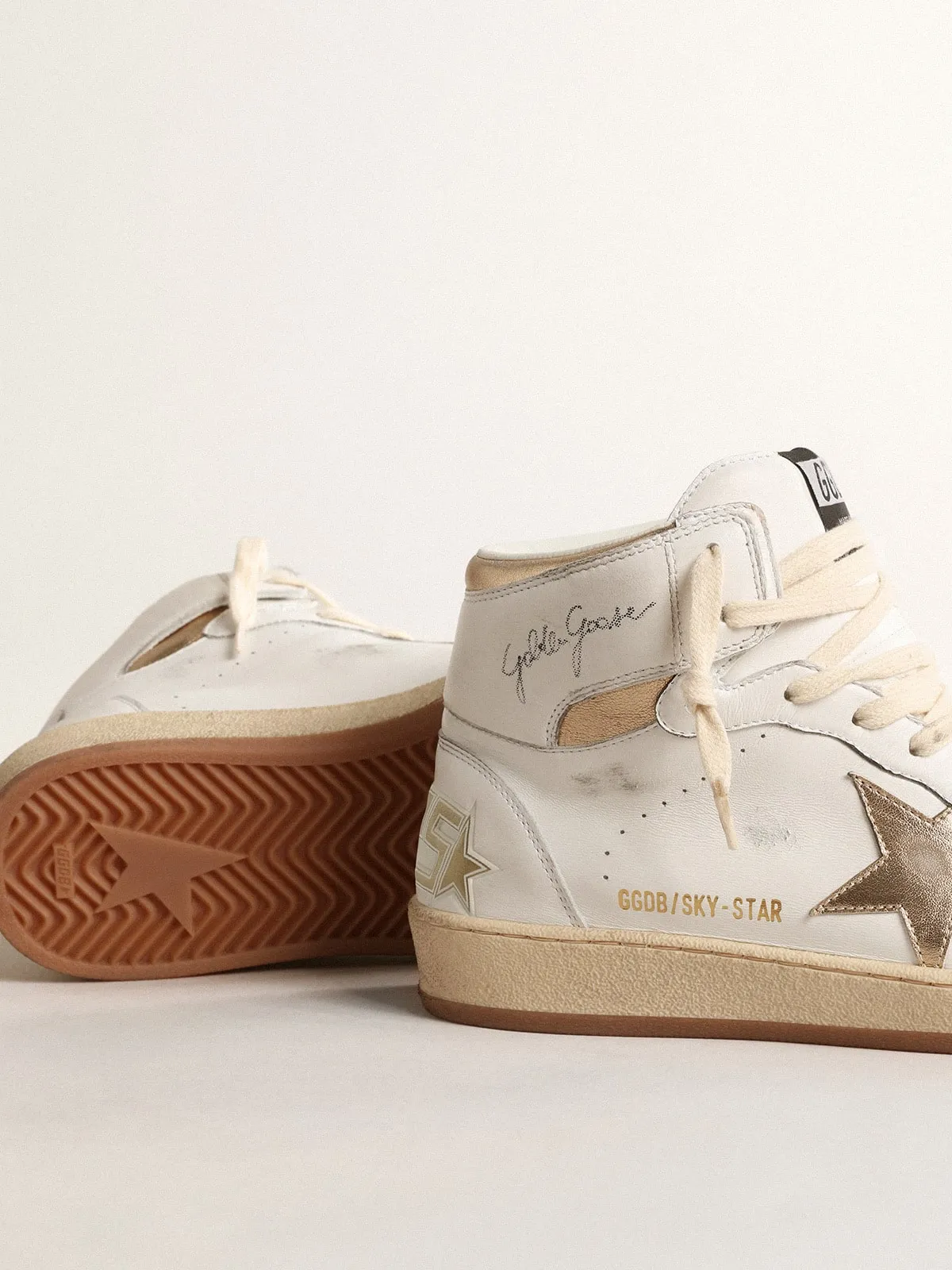 Sky-Star en cuir nappa blanc avec étoile et contrefort en cuir lamé doré | Golden Goose